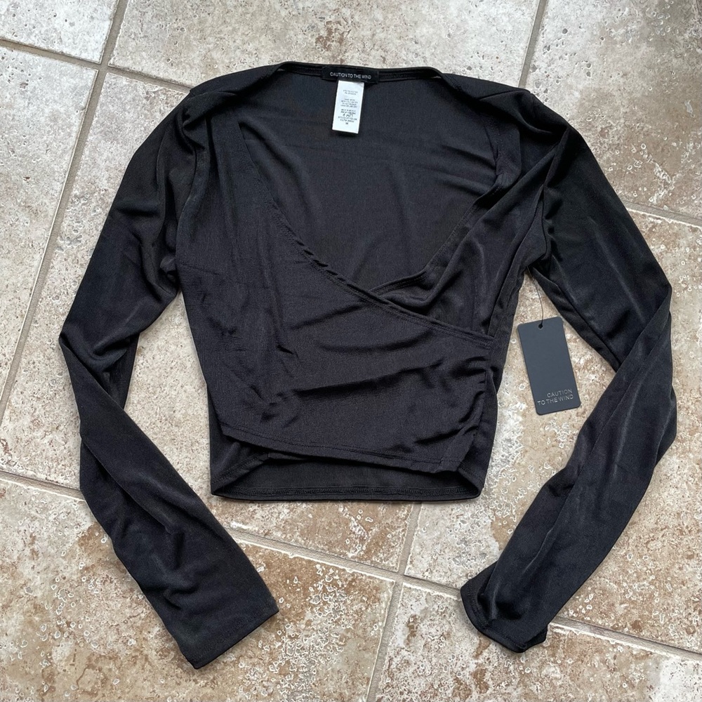 Caution to the Wind Black Wrap Top